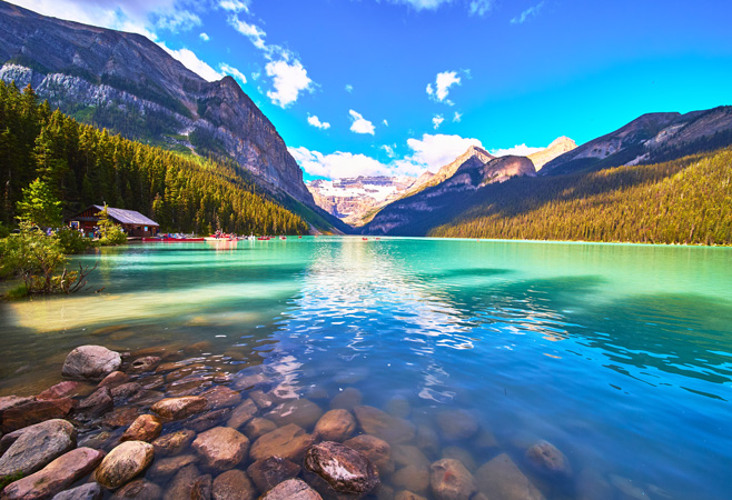 You'll experience long daylight hours and warm temperatures (20°C to 30°C), perfect for hiking in the Rockies, visiting Niagara Falls, or exploring cities like Vancouver and Toronto.