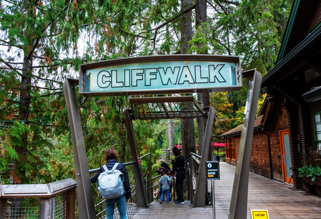 The Cliffwalk is a narrow walkway above granite cliffs, with glass, small spaces, stairs, and a section over a ravine The Cliffwalk is a narrow walkway above granite cliffs, with glass, small spaces, stairs, and a section over a ravine