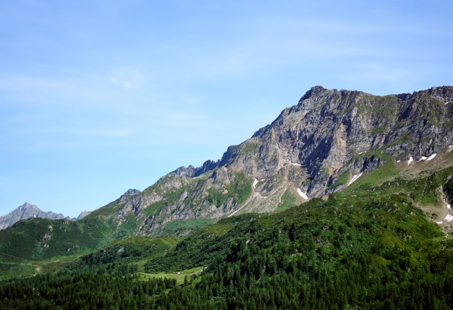 The geological wonder and cultural significance of Barbeau Peak , as well as the unique challenges of Arctic exploration.