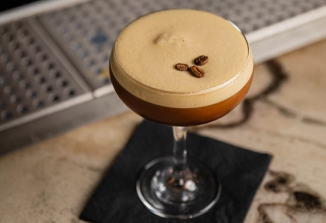 Add vodka, coffee liqueur, espresso, and simple syrup to a shaker filled with ice and shake until well-chilled. Add vodka, coffee liqueur, espresso, and simple syrup to a shaker filled with ice and shake until well-chilled.